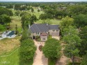 Welcome to your dream home in the prestigious Southern Trace for sale in Shreveport Louisiana Caddo Parish County on GolfHomes.com