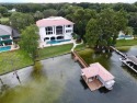 Majestic Lake Butler lakefront, Sunset views, Disney fireworks for sale in Windermere Florida Orange County County on GolfHomes.com