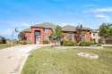 Welcome to your dream home  nestled within a prestigious gated for sale in Plano Texas Collin County County on GolfHomes.com