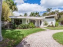 A MAGNIFICENT MID CENTURY MODERN WITH AN AMAZING MULTI-LEVEL for sale in Hollywood Florida Broward County County on GolfHomes.com