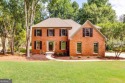 Embrace luxury living at its finest in this fully renovated for sale in Suwanee Georgia Forsyth County County on GolfHomes.com