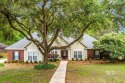 Nestled on a quiet circle in the Rock Creek Golf Community, this for sale in Fairhope Alabama Baldwin County County on GolfHomes.com