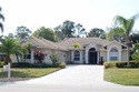 Stunning 3 bedroom, 3.5 pool home situated on an estate lot for sale in Fort Pierce Florida Saint Lucie County County on GolfHomes.com