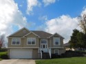 Introducing a stunning split-level home that embodies the for sale in Warrensburg Missouri Johnson County County on GolfHomes.com