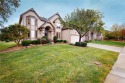 If you are looking for a golf course view 2 story home, here it for sale in Lenexa Kansas Johnson County County on GolfHomes.com