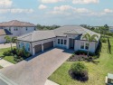 Elegant West Indies-Inspired semi-custom Home in Rivo Lakes - for sale in Sarasota Florida Sarasota County County on GolfHomes.com
