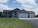 Welcome to a beautiful dream home located just steps away from for sale in Hayfield Twp Minnesota Dodge County County on GolfHomes.com
