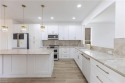 Fully Remodeled Lakeside Luxury in Troon Lakes at Pelican Marsh
 for sale in Naples Florida Collier County County on GolfHomes.com