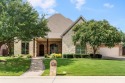 Tucked inside the gated community of The Retreat at Firewheel for sale in Garland Texas Dallas County County on GolfHomes.com