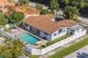 Beautifully appointed and designer decorated pool home in for sale in Hollywood Florida Broward County County on GolfHomes.com