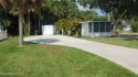 This great RV Lot is set back off the street and nestled up to for sale in Titusville Florida Brevard County County on GolfHomes.com