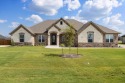 2025 like-new Coutto home with stunning interior features for sale in Granbury Texas Hood County County on GolfHomes.com