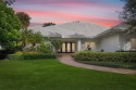 This stunning Palm Beach Bermuda-style home is perfectly for sale in West Palm Beach Florida Palm Beach County County on GolfHomes.com