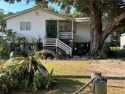 Adorable raised cottage on a shaded level lot in the heart of for sale in Dauphin Island Alabama Mobile County County on GolfHomes.com