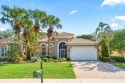 Tropical Oasis in Boynton Beach!This beautifully renovated home for sale in Boynton Beach Florida Palm Beach County County on GolfHomes.com