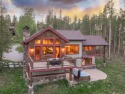 This classic mountain home is set low off Highlands Drive for sale in Breckenridge Colorado Summit County County on GolfHomes.com