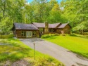 Welcome to 'Fireside'!  This lovely lake cottage nestled inside for sale in Terra Alta West Virginia Preston County County on GolfHomes.com