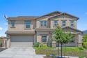 Step onto the inviting front porch and into a luxurious for sale in Temecula California Riverside County County on GolfHomes.com