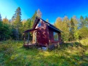 HERE'S A CHANCE to own a cabin on the Saddleback Mountain Road for sale in Sandy River Plt Maine Franklin County County on GolfHomes.com