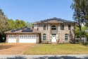 Spacious Golf Course home at Hidden Creek Estates has open floor for sale in Navarre Florida Santa Rosa County County on GolfHomes.com