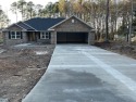 The Willow, by Gainey Construction, sits on more than a half for sale in Sumter South Carolina Sumter County County on GolfHomes.com