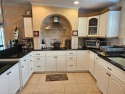 This home is located on leased land in a 55+ resort-style MH for sale in Lakeland Florida Polk County County on GolfHomes.com