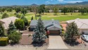 Golf course home boasts stunning views and a soothing color for sale in Dewey-Humboldt Arizona Yavapai County County on GolfHomes.com