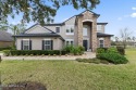 Absolutely stunning custom home, fully renovated from top to for sale in Orange Park Florida Clay County County on GolfHomes.com