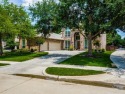 Tucked away at the end of a quiet, wooded cul-de-sac, this for sale in Allen Texas Collin County County on GolfHomes.com