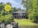 LAKE FRONT in a SECLUDED COVE just seconds to BIG WATER & only 8 for sale in Chapin South Carolina Lexington County County on GolfHomes.com