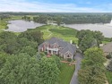 This luxurious residence epitomizes upscale living with stunning for sale in Prior Lake Minnesota Scott County County on GolfHomes.com