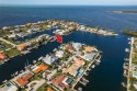 Location, Luxury, Lifestyle!! Imagine waking up to dolphins for sale in New Port Richey Florida Pasco County County on GolfHomes.com
