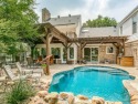 It's POOL Season! Enjoy summer days & nights under the roofed for sale in Trophy Club Texas Denton County County on GolfHomes.com