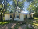 Tucked away on a double lot in the gated community of Linn for sale in Linn Valley Kansas Linn County County on GolfHomes.com