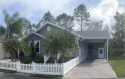 This has says WOW as you pull up to the gorgeously landscaped for sale in Plant City Florida Hillsborough County County on GolfHomes.com