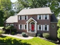 This stunning 4-bedroom, 3.5-bath all-brick colonial has it all for sale in Green Ohio Summit County County on GolfHomes.com