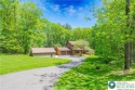 Looking for Country Charm with MODERN updates? This cedar clad for sale in Kunkletown Pennsylvania Monroe County County on GolfHomes.com