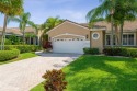 Enjoy an easy and full life in Wycliffe County Club! Move right for sale in Wellington Florida Palm Beach County County on GolfHomes.com