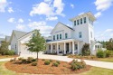 Luxury meets effortless charm at this stunning coastal retreat for sale in Inlet Beach Florida Walton County County on GolfHomes.com