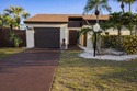 Welcome home! Fully renovated luxury patio home stands far above for sale in Lake Worth Florida Palm Beach County County on GolfHomes.com