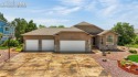 Immaculate, Upgraded Rancher with Golf Course Views + Heated for sale in Peyton Colorado El Paso County County on GolfHomes.com