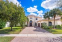 Welcome to your dream home in the heart of the prestigious gated for sale in Lake Worth Florida Palm Beach County County on GolfHomes.com