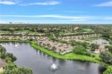 Serenity! This rare end unit location allows for water views for sale in Bonita Springs Florida Lee County County on GolfHomes.com