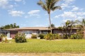 One or more photo(s) has been virtually staged. Light and bright for sale in Rotonda West Florida Charlotte County County on GolfHomes.com