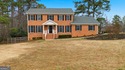 Welcome home to 560 Clubhouse Drive, ideally situated on a quiet for sale in Conyers Georgia Rockdale County County on GolfHomes.com