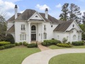 Welcome to this expansive estate in the esteemed and guard gated for sale in Johns Creek Georgia Fulton County County on GolfHomes.com
