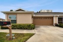 This 3 bedroom 2 bath villa has many upgrades and shows like a for sale in Palmetto Florida Manatee County County on GolfHomes.com