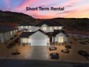 Fully furnished and rental-ready, this profitable vacation home for sale in Washington Utah Washington County County on GolfHomes.com