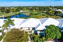 Beautifully reimagined 2-bedroom plus den residence, ideally for sale in Boynton Beach Florida Palm Beach County County on GolfHomes.com
