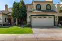 Check out this RARE gem! A stunning two-story townhome, built in for sale in Glendale Arizona Maricopa County County on GolfHomes.com